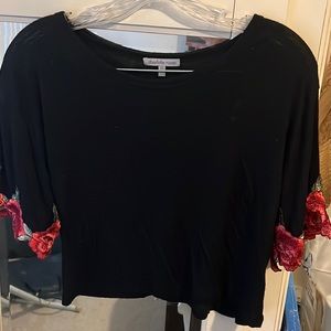 Charlotte Russe Black crop top with rose arms